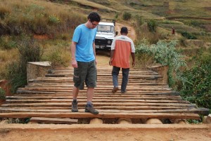 Photo of Tom inspecting a newly-patched bridge